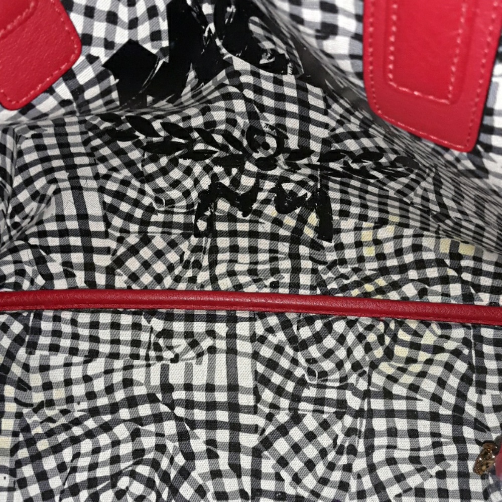 Red and black MCM purse and shoulder bag